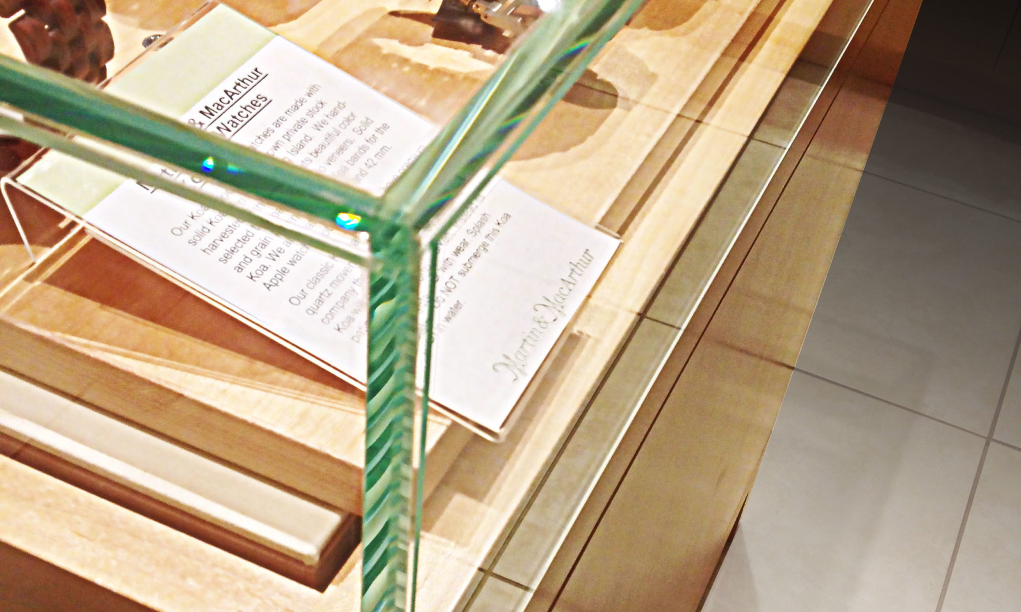 photo: custom glass display cases for retail merchandise